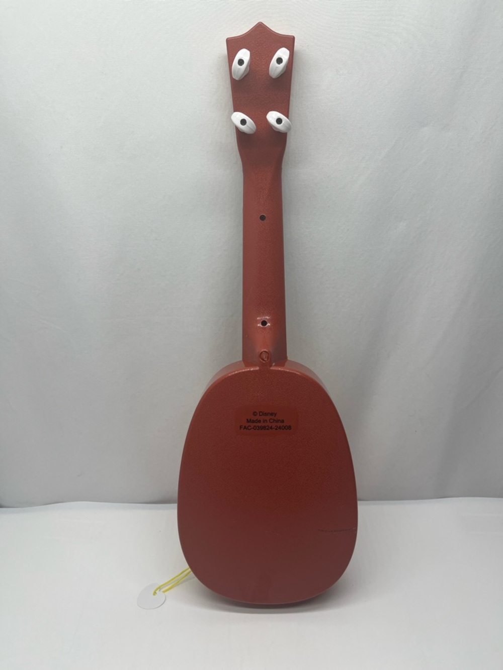 Disney Olaf Wooden Look Orange and Black Kids Ukulele Toy - Picture 4 of 6
